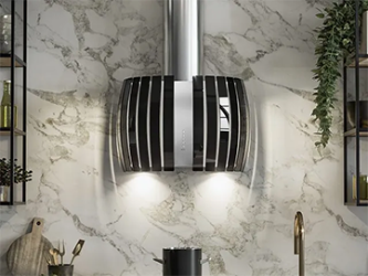 A kitchen with a hood hanging from the ceiling and a sink.