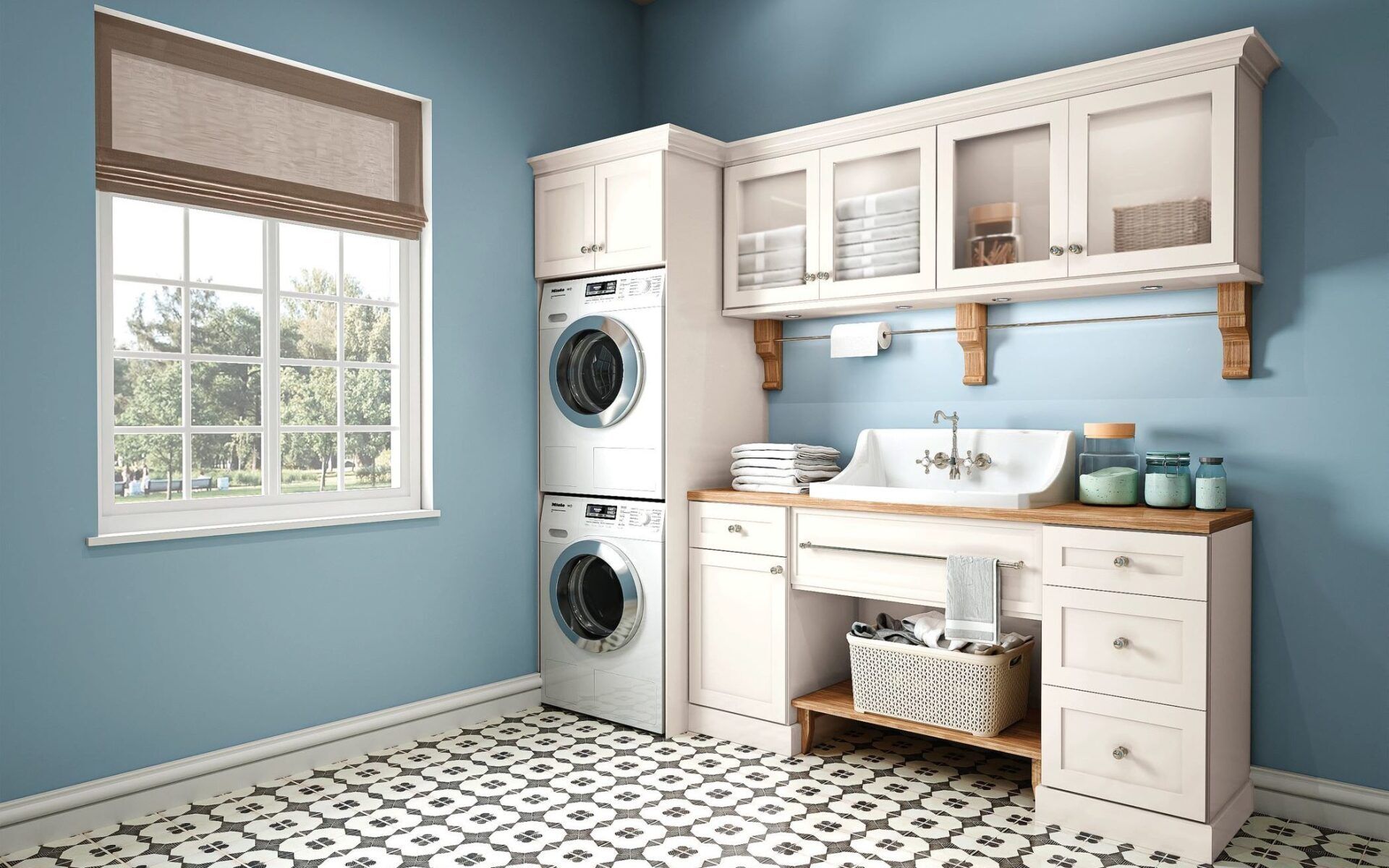 A laundry room with a washer and dryer stacked on top of each other.