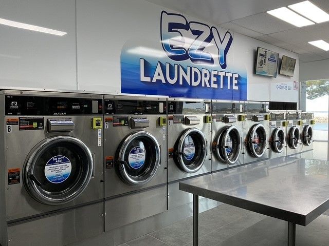 Row of Washing Machines in a Laundromat — Ezy Laundrette Diamond Beach in Diamond Beach, NSW