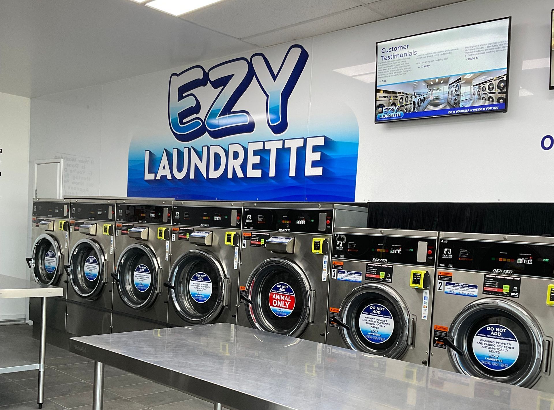 EZY Laundrette Interior With Rows of Washing Machines — Ezy Laundrette Diamond Beach in Old Bar, NSW