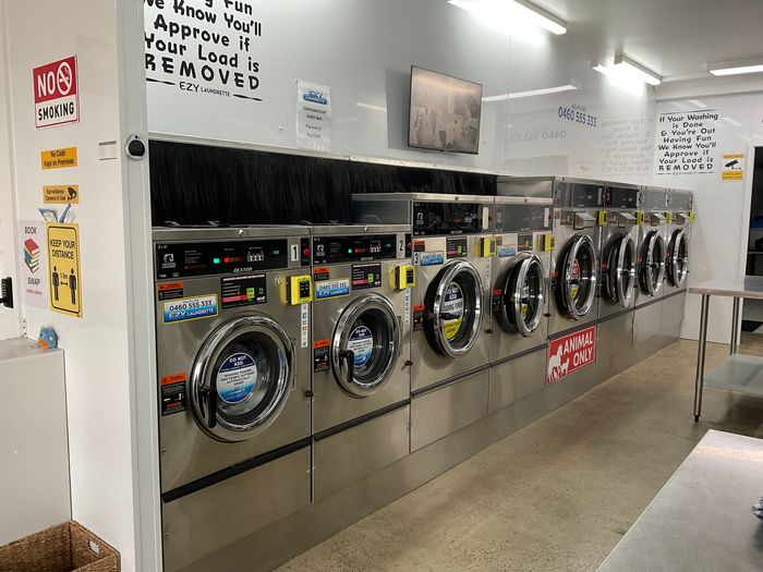 Row of Washing Machines in a Laundromat — Ezy Laundrette Diamond Beach in Diamond Beach, NSW
