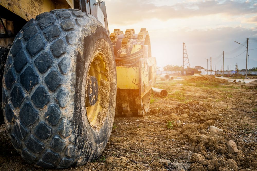 Close-Up of Construction Equipment Tire on Dirt — STJ Earthmoving in Dimbulah, QLD