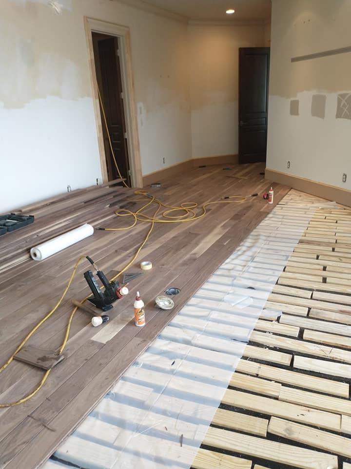 Custom floor being worked on with the highest quality products