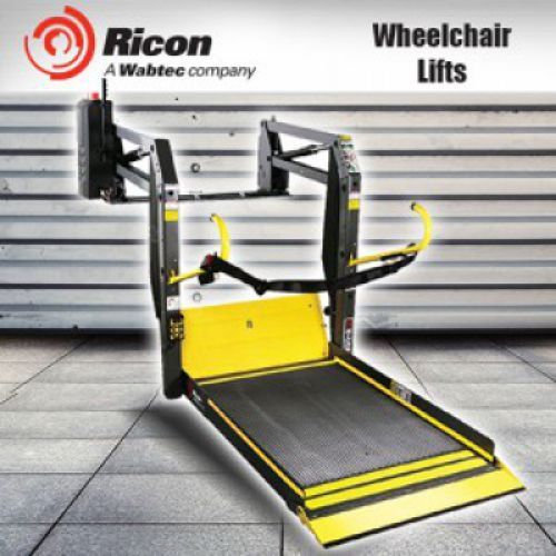 Ricon wheelchair lift. Yellow and black platform, metallic frame. Grey and white background.