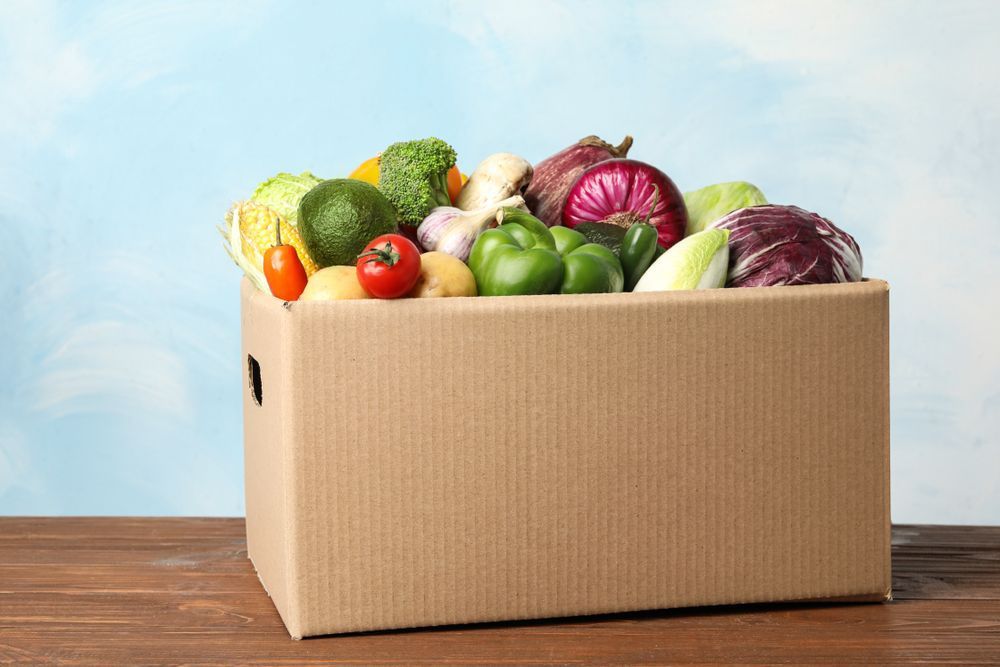Diffirent Types Of Fresh Vegetables In Cardboard Box On Wooden Table — Fresh to Door In Fyshwick ACT