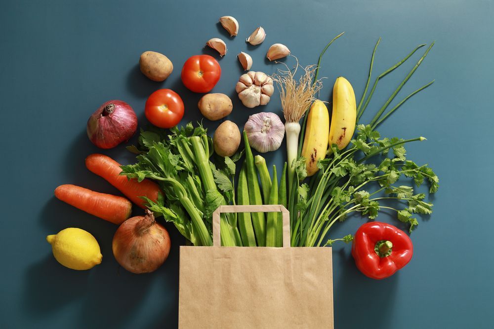 Paper Bag Of Different Tropical Fresh Fruits And Vegetables — Fresh to Door In Canberra ACT