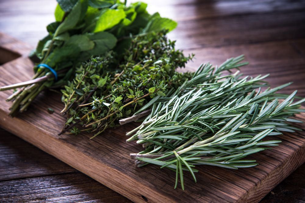 Bunch Of Garden Fresh Herbs On Wooden Board — Fresh to Door In Fyshwick ACT