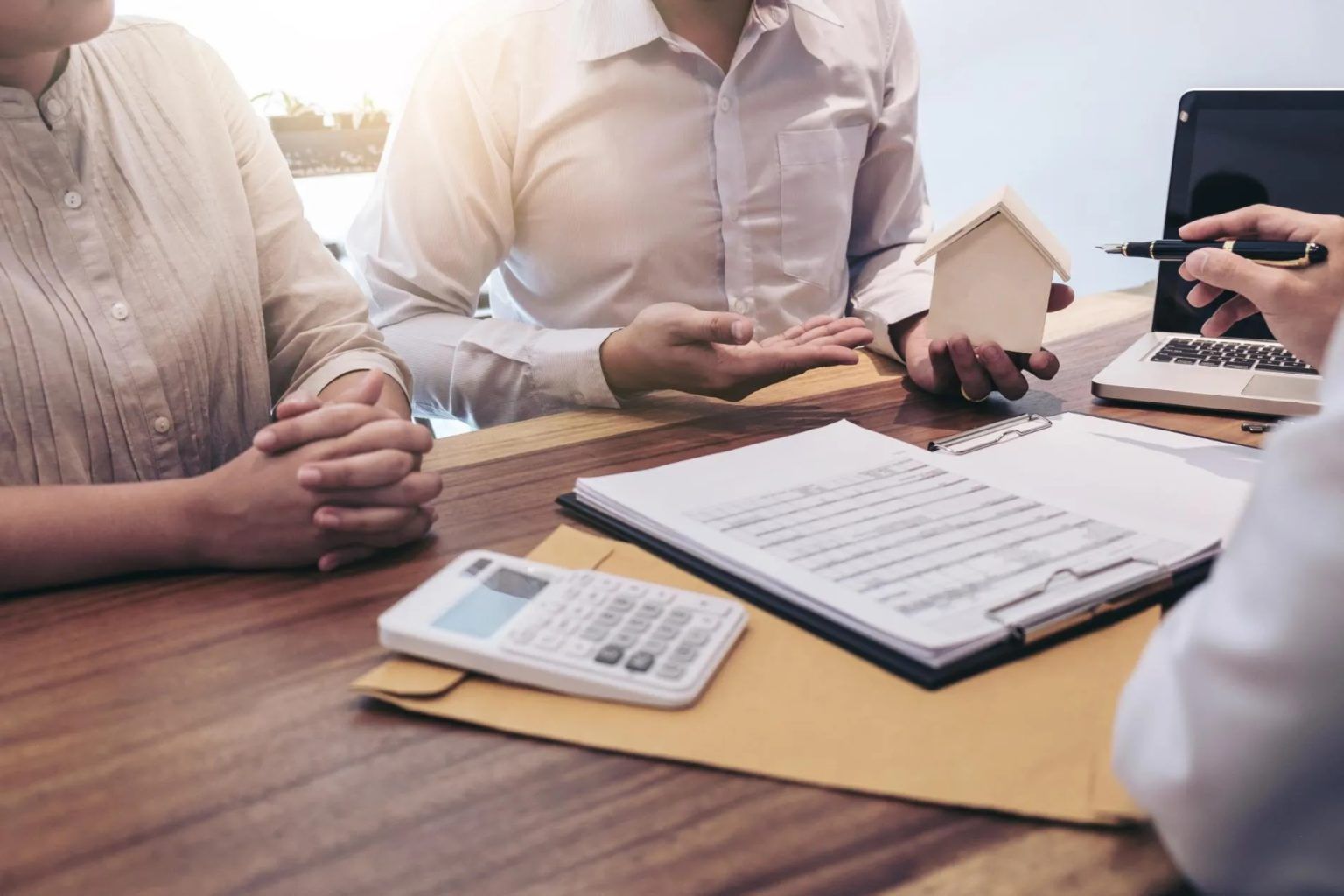 Borrowers going over the loan process for short term private money loans.