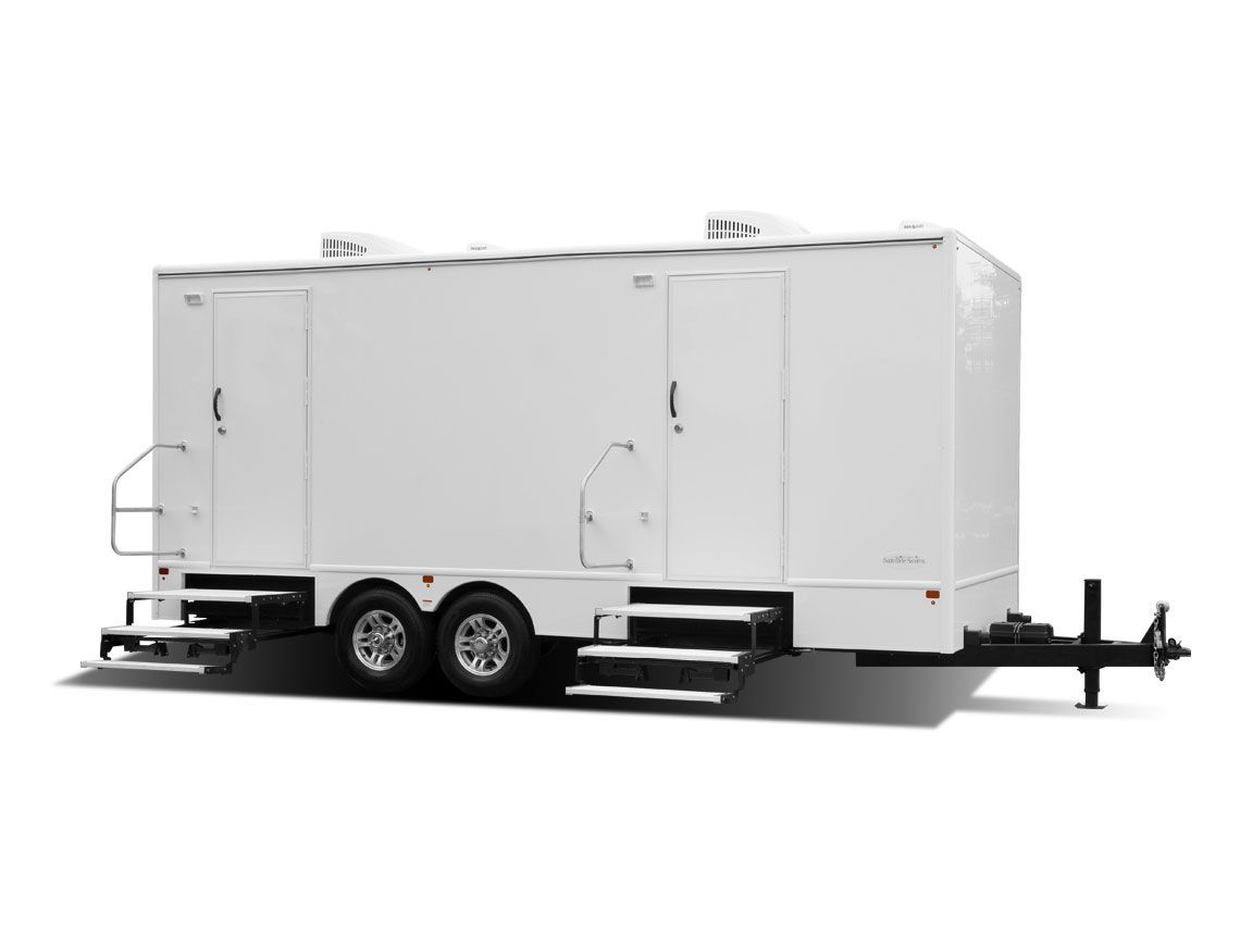 White enclosed dual-axle utility trailer with black frame and hitch on a plain white background