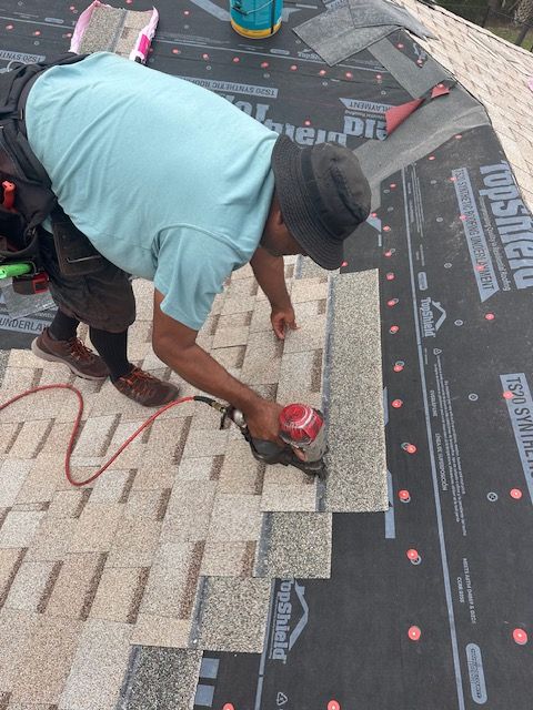 Guy holding hard hat