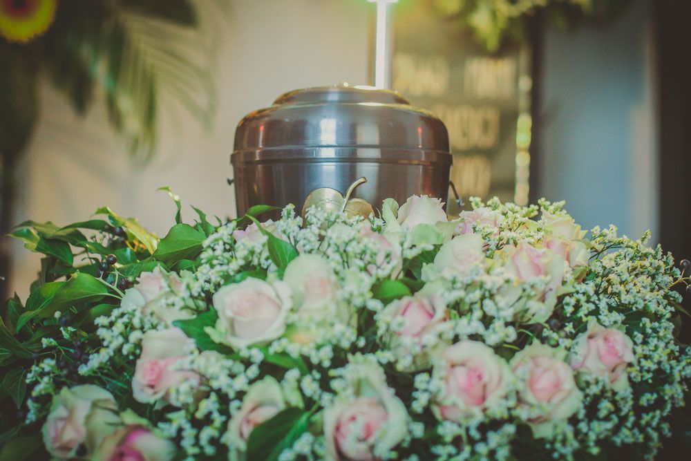 A Metal Urn With Ashes Of A Dead Person On A Funeral With No One Around On A Memorial Service — Funeral Extras & Urns in The Entrance, NSW