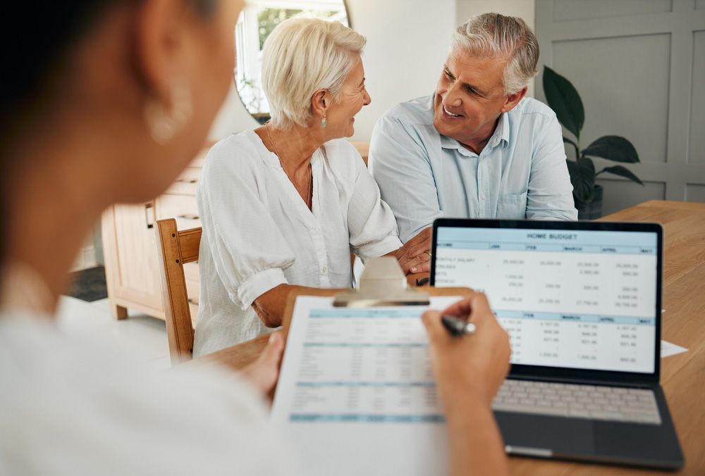 Woman Consulting Funeral Policy Worker — Create an Online Will in The Entrance, NSW