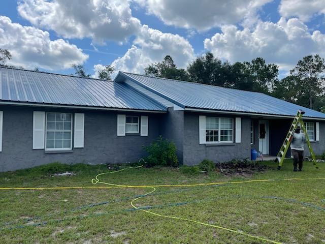 Cleaning Red Metal Roof After