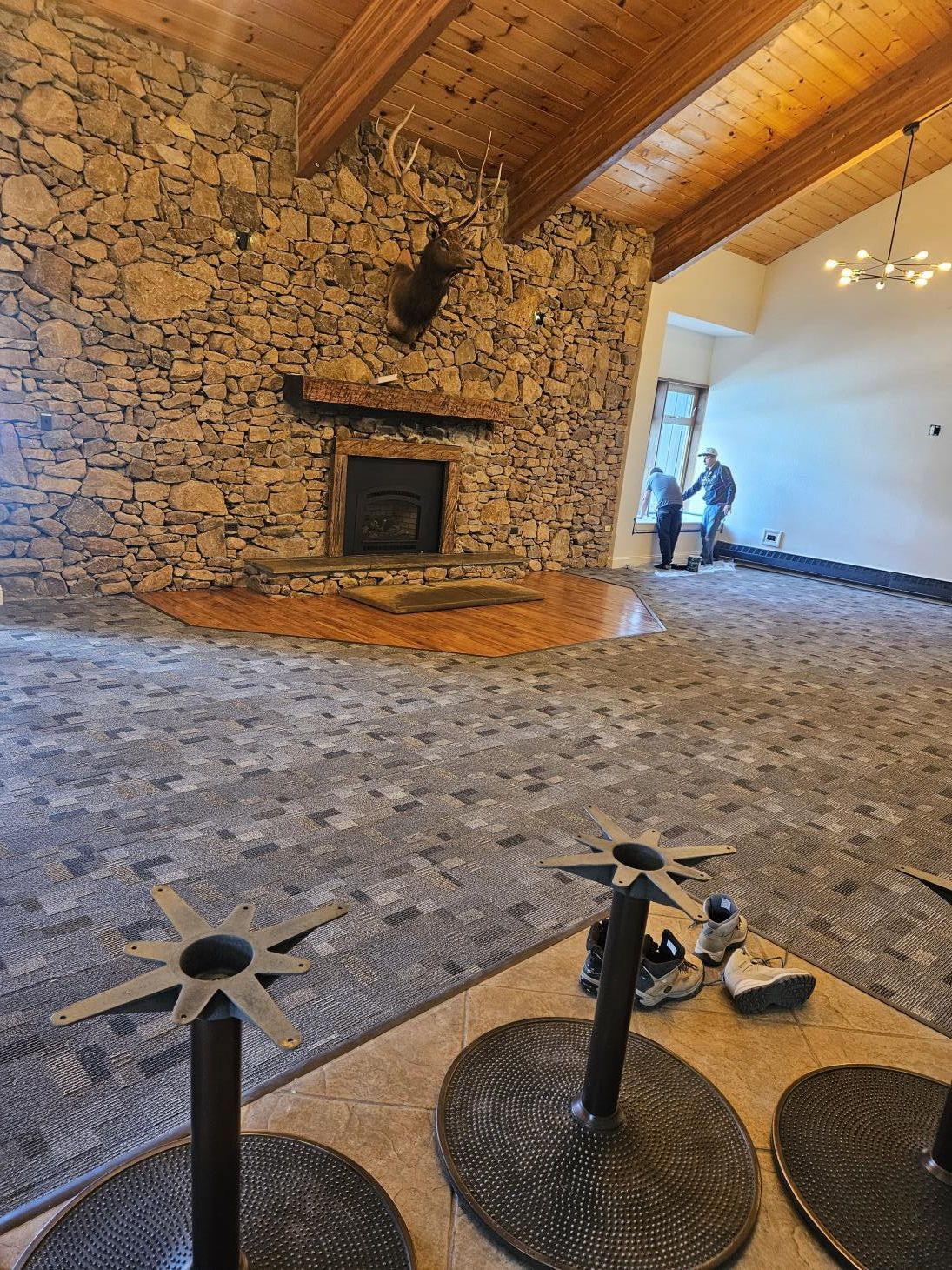 a kitchen with a large island in the middle of the room .