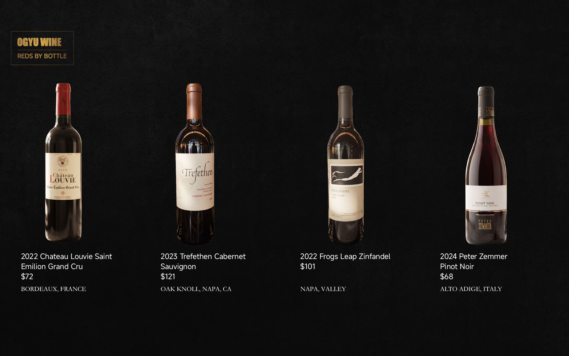 Four wine bottles with labels displayed side by side on a dark background, like a product lineup.