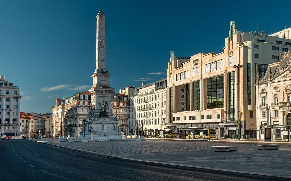 Praça dos Restauradores in Lisbon, with its tall obelisk in the middle
