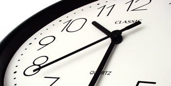 A close up of a classic quartz clock