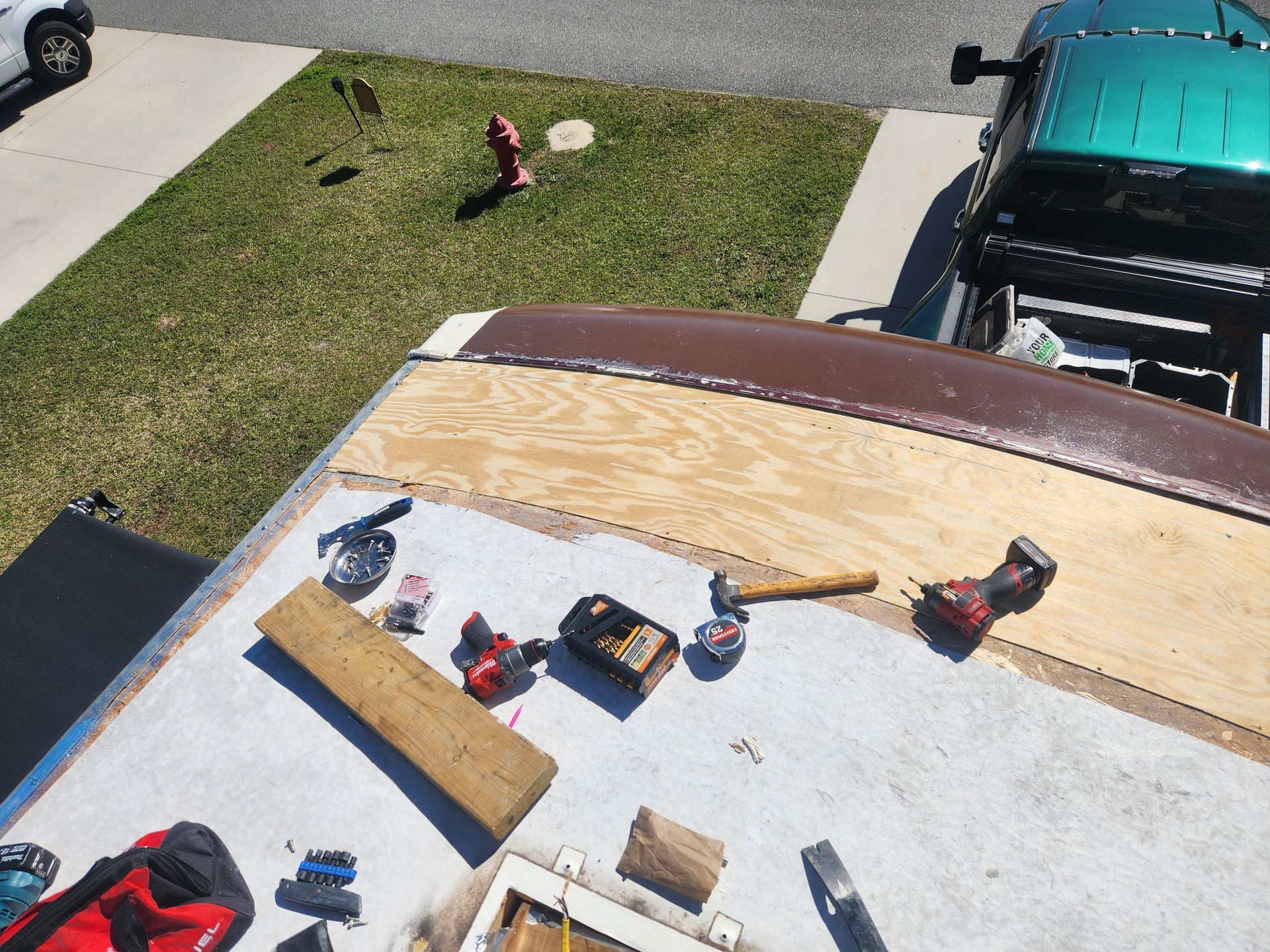 An aerial view of a roof with tools on it
