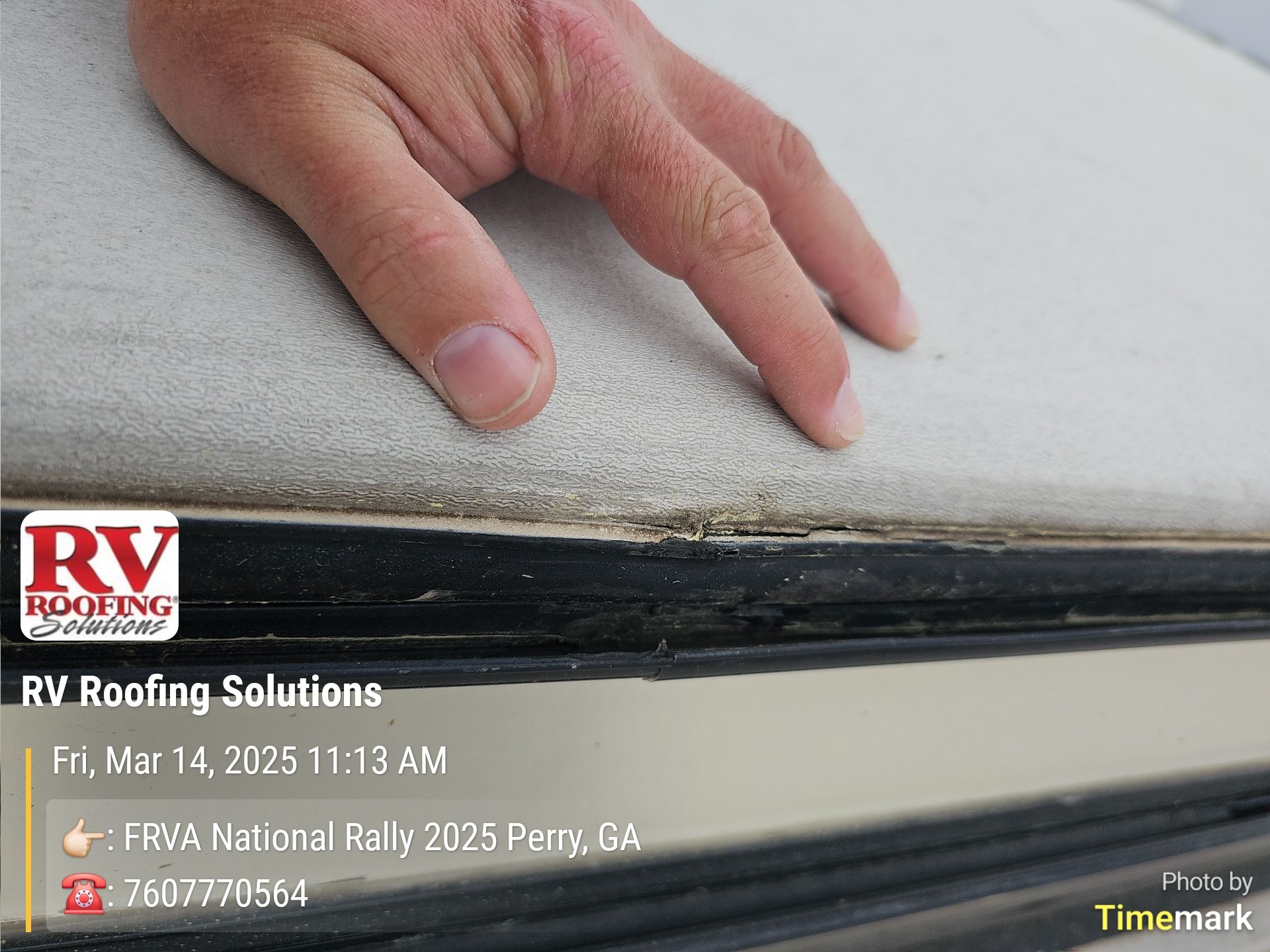 Hand touching the edge of a RV roof with visible wear and tear; RV Roofing Solutions logo.