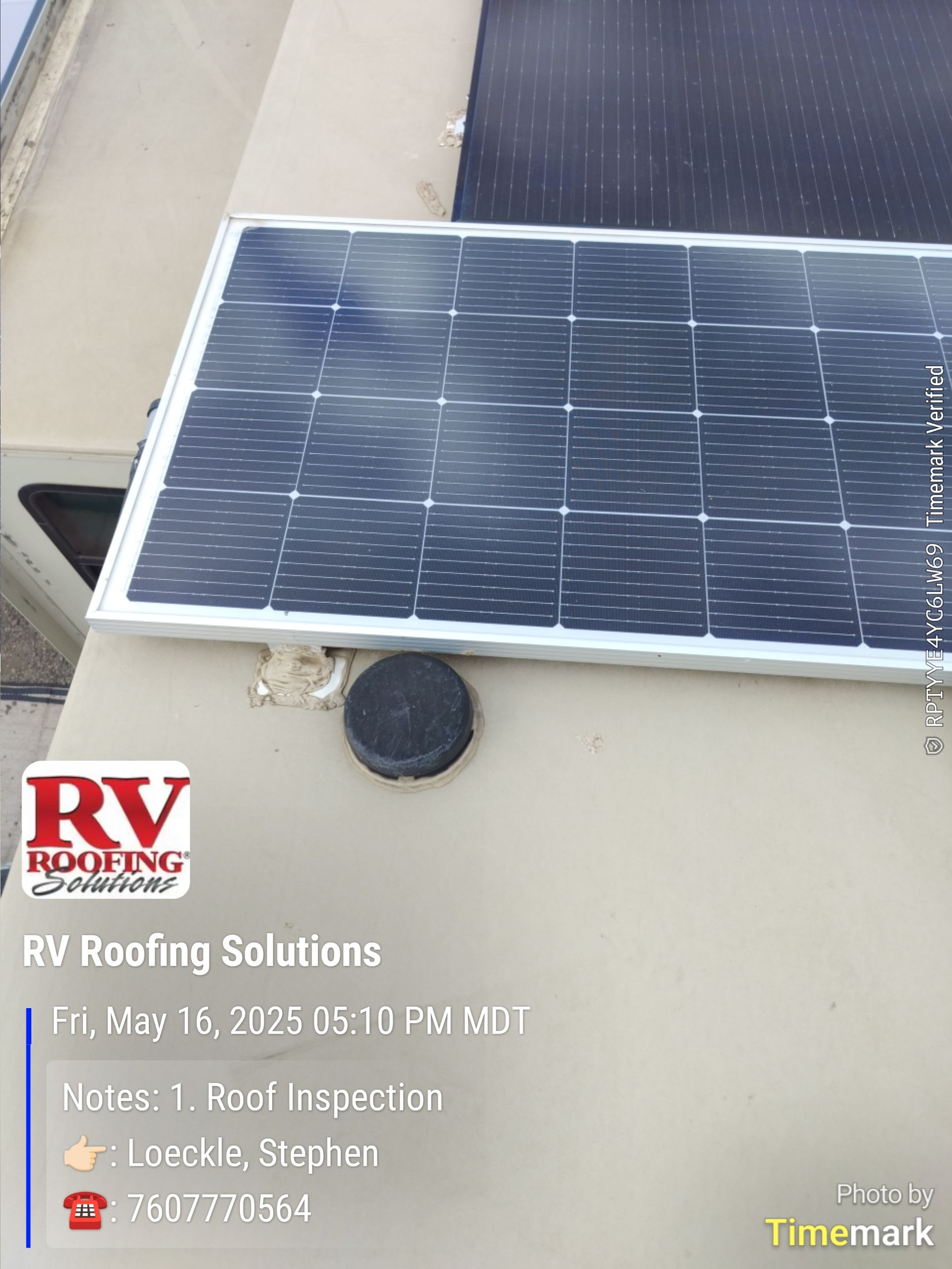 Solar panel mounted on a beige RV roof, with a black circular vent and text about roof inspection.