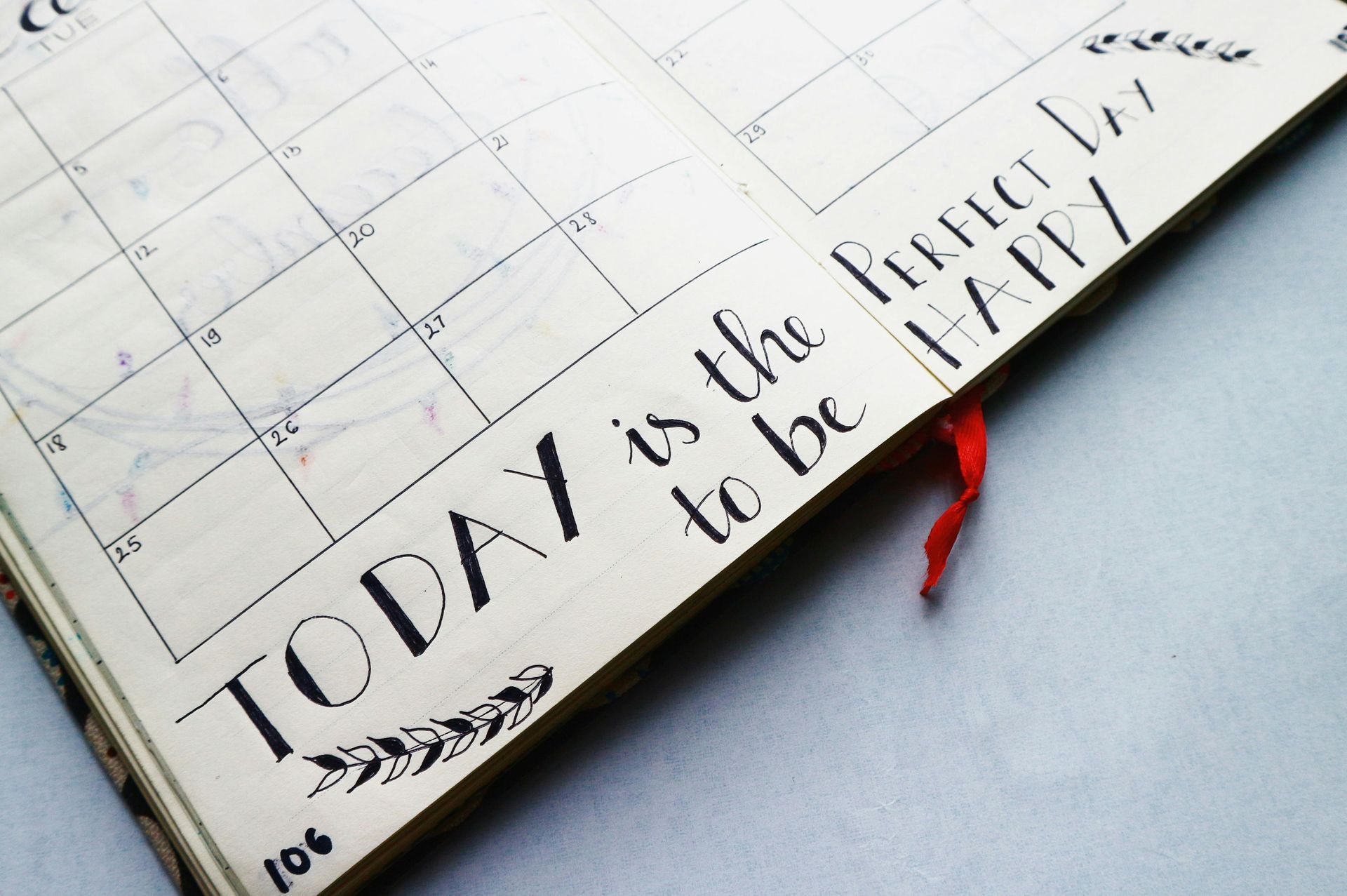 A calendar that says today is the time to be happy