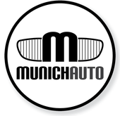 A black and white logo for munichauto in a circle.
