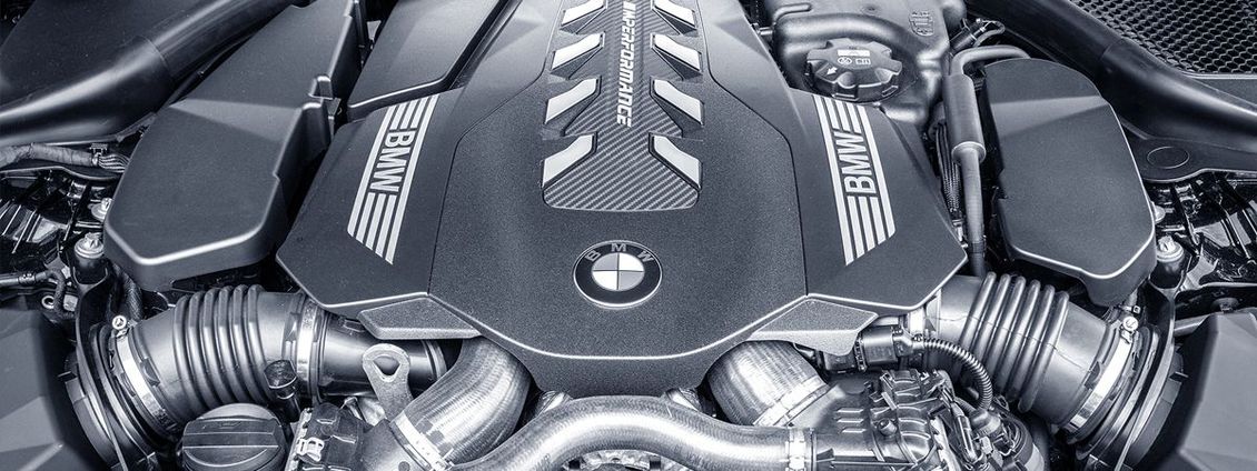 A close up of the engine of a car.