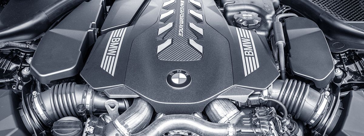 A close up of the engine of a car.