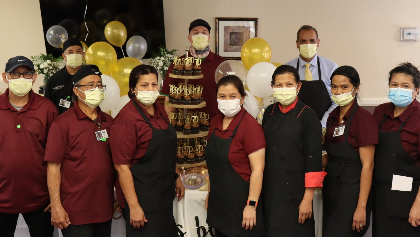 Staff photo wearing maroon collared shirts in Artesia, CA.
