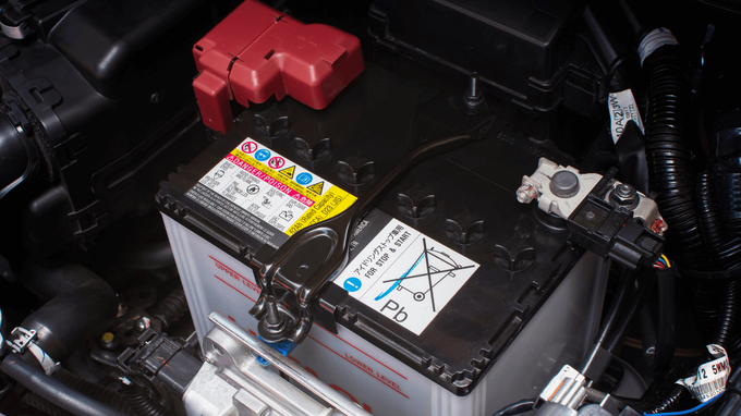 a mechanic doing a battery replacement in Gainesville Georgia