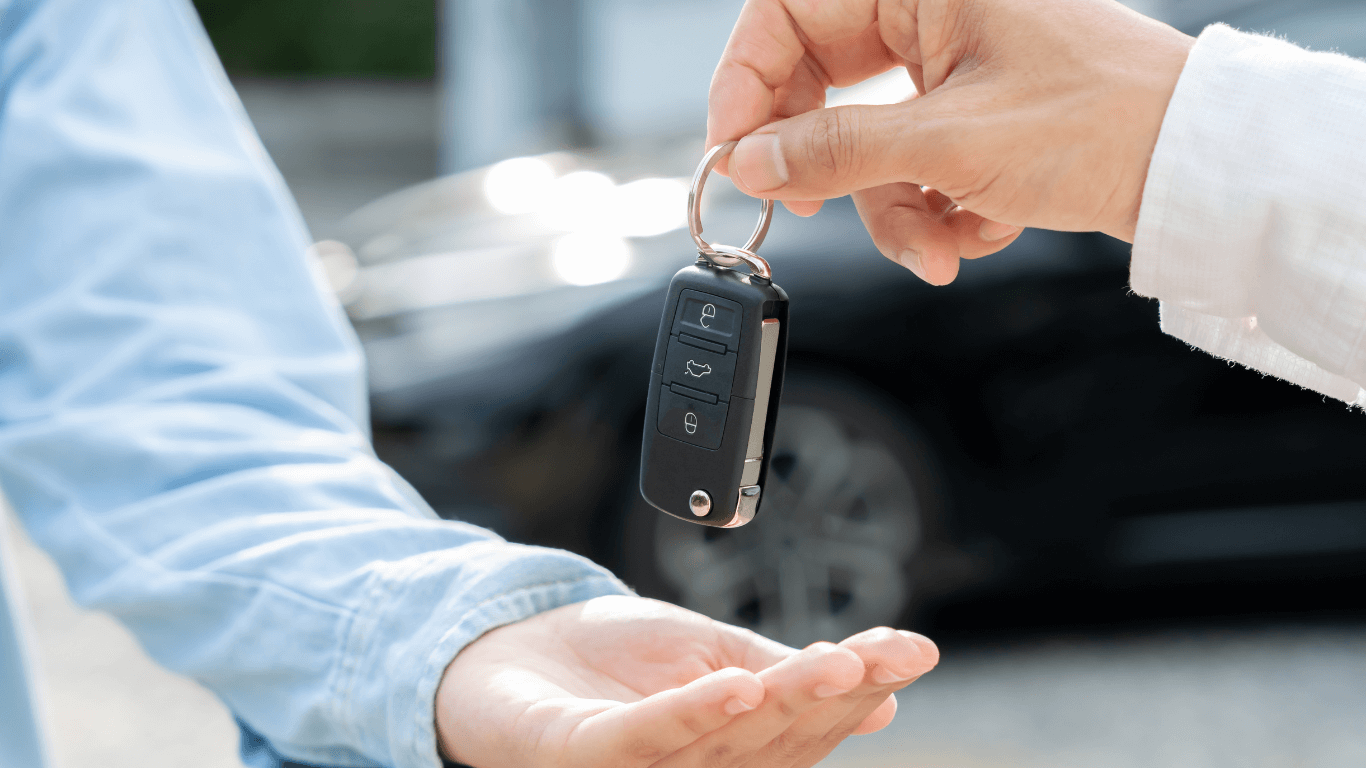 handing over keys to a buyer