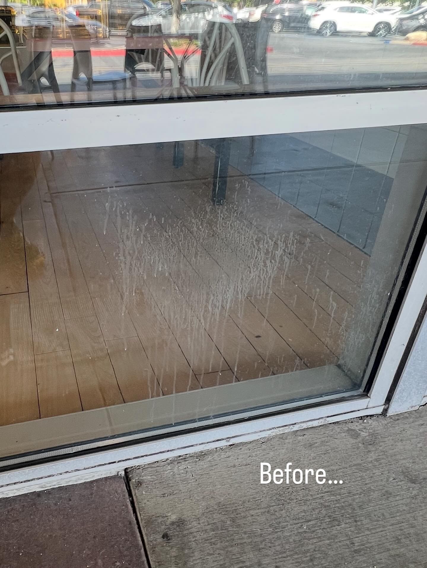 Broken glass patio door with shattered lower pane and “Before...” text overlay