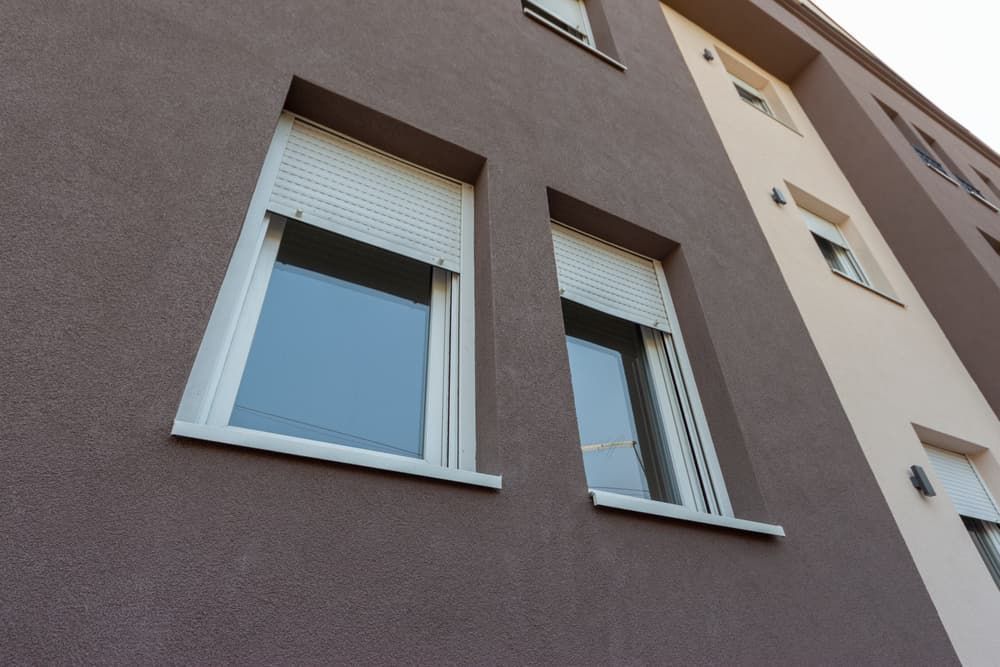 Building With Windows And Blinds — Pelican Glass in Swansea, NSW