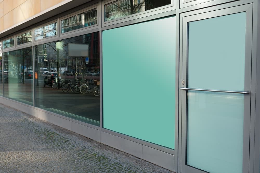 A Storefront With An Indoor Blinds — Pelican Glass in Charlestown, NSW