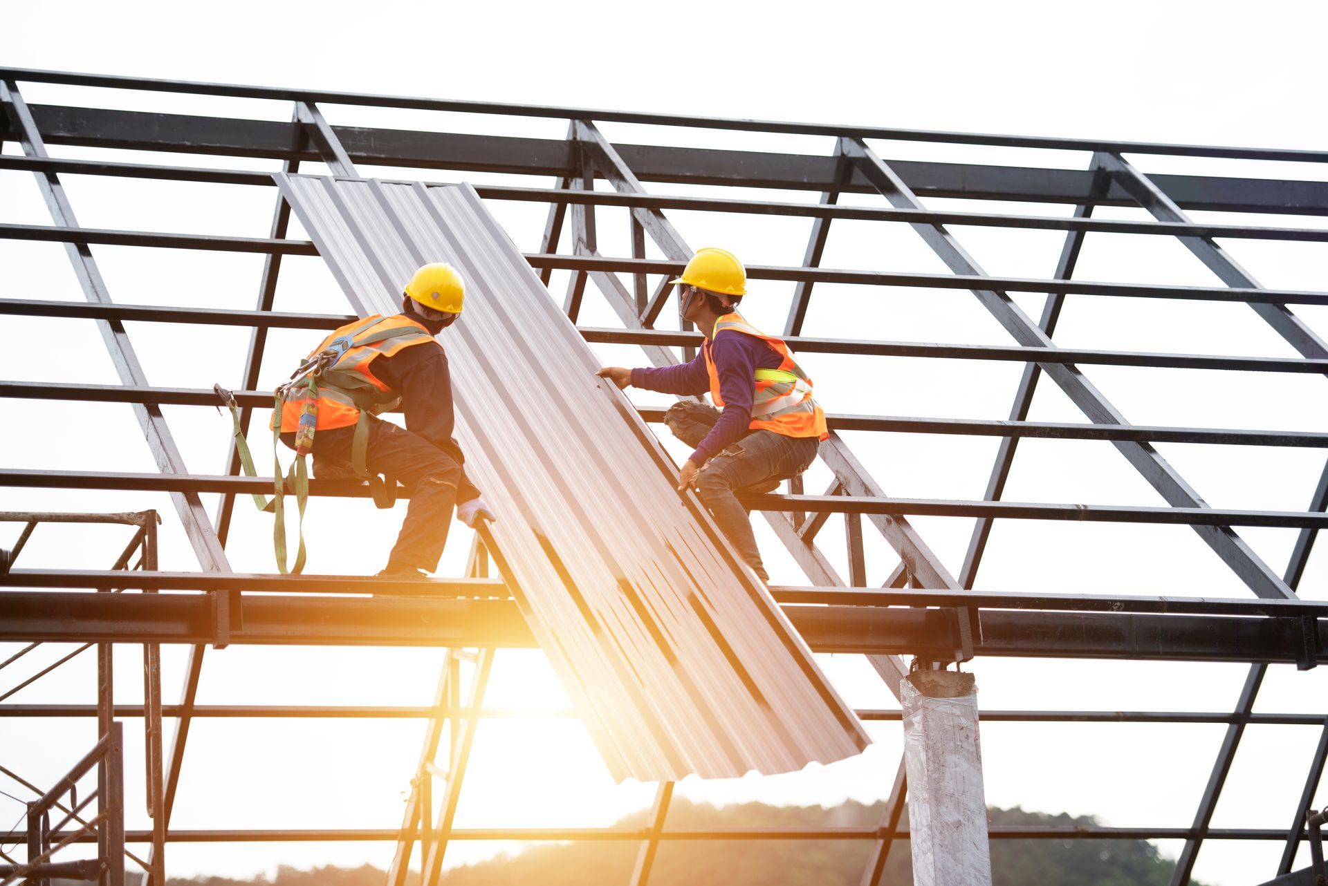 Installation of metal roof sheets by professionals, providing reliable commercial roofing services. Installation of metal roof sheets by professionals, providing reliable commercial roofing services.