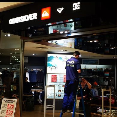Working On Commercial Signage — Electricians in Sydney, NSW Working On Commercial Signage — Electricians in Sydney, NSW