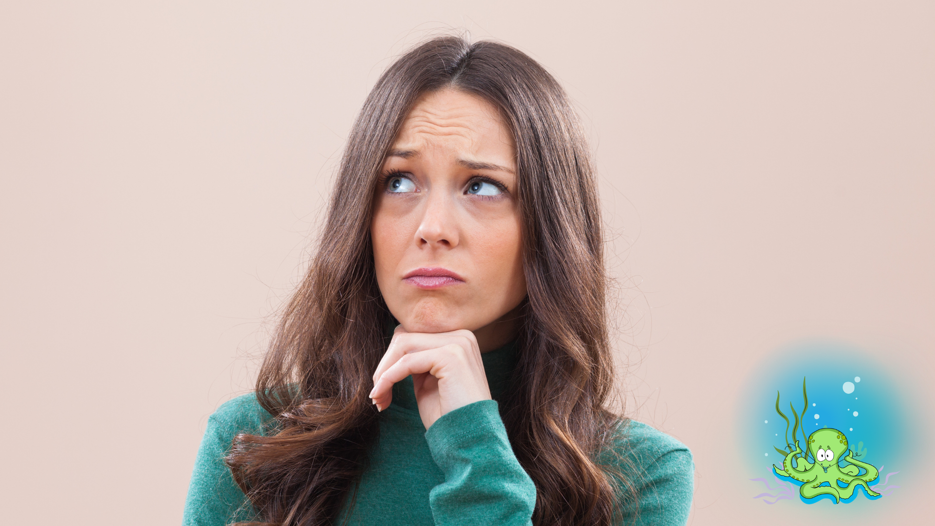 A person with long brown hair wearing a green top looks upward with a thoughtful expression while resting a hand on their chin.