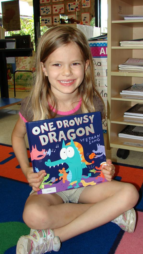 Choosing A Book To Donate — Honolulu, HI — Good Shepherd Preschool