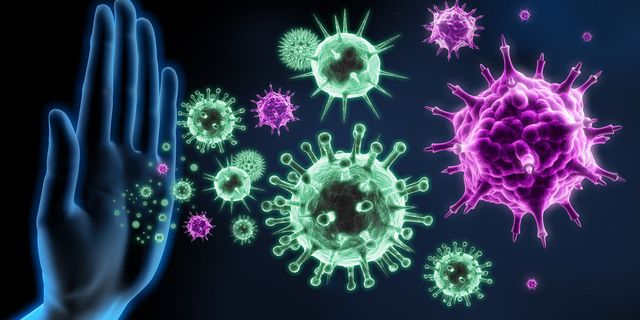 A hand is reaching out to stop a group of bacteria.