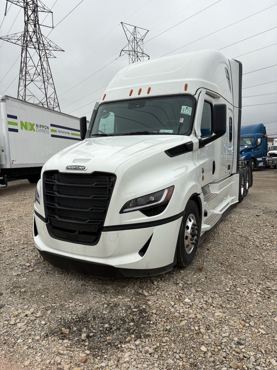 2025 Freightliner Cascadia 5th generation white sleeper truck with factory MirrorCam system 
