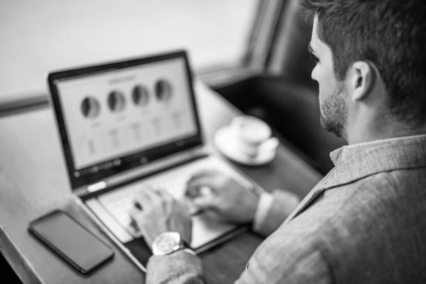 Professional working on business strategy using a laptop