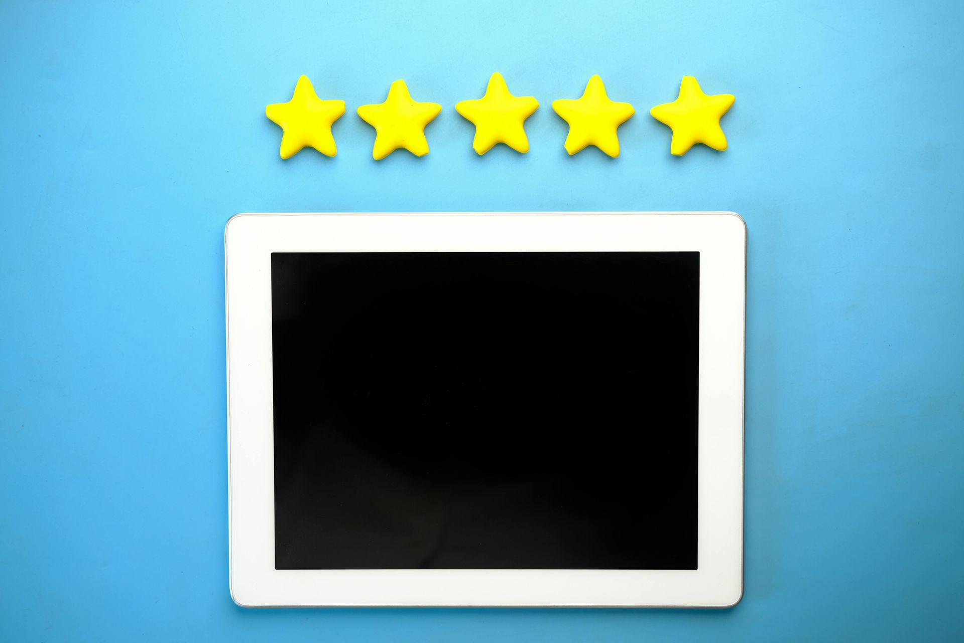 A five yellow stars on a blue background.