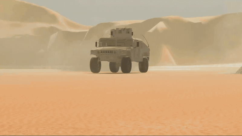 Armored vehicle driving across a sandy desert with dunes in the background