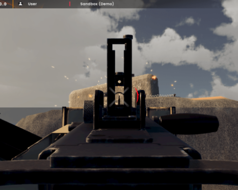 First-person view aiming a gun over rocky terrain toward a smoky explosion at sunset