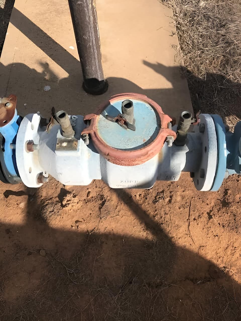 A Close Up Of A Water Meter On The Ground — Nudges Plumbing In Dubbo, NSW