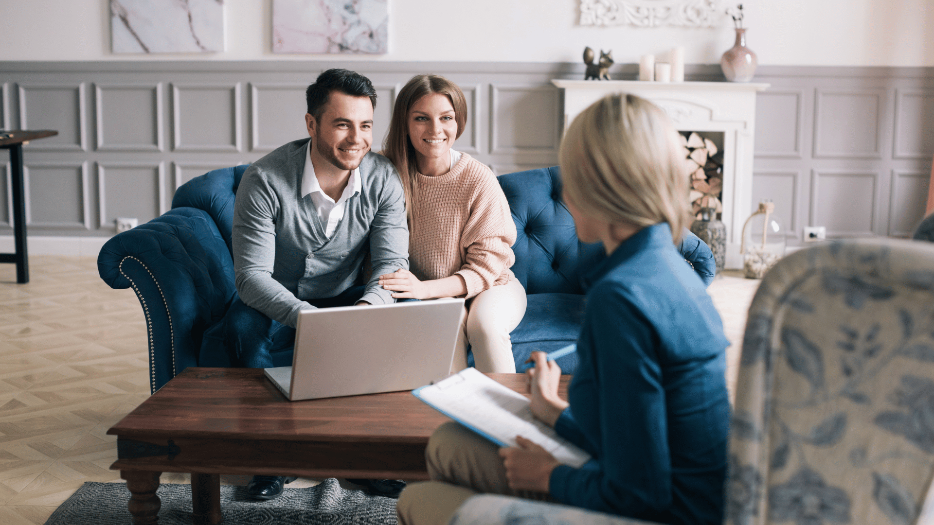 An empathetic family consultation with a financial expert in a living room, discussing pre-foreclosure solutions with paperwork.