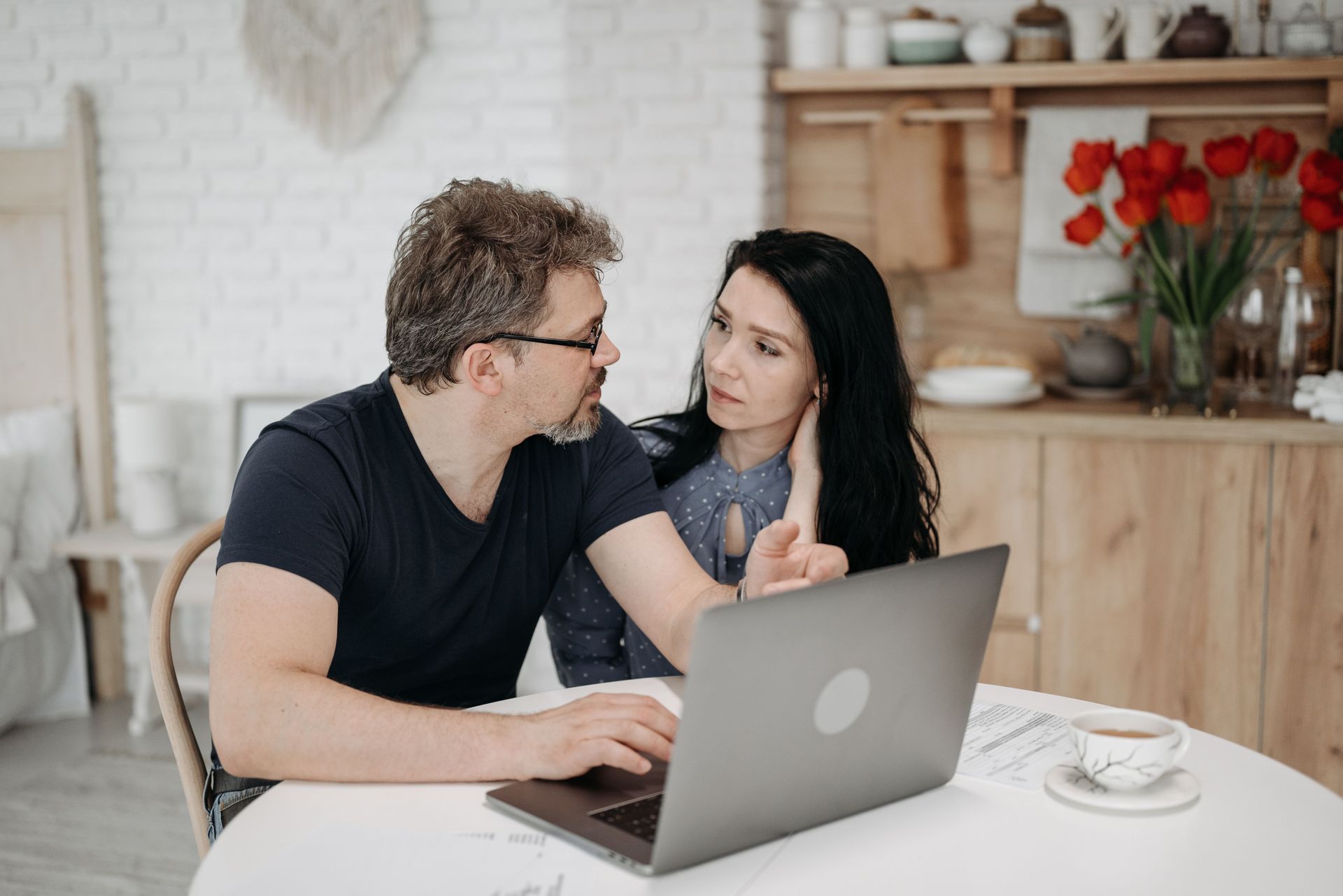 Two people talking and discussing options.
