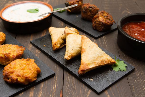Crispy samosas with dipping sauce