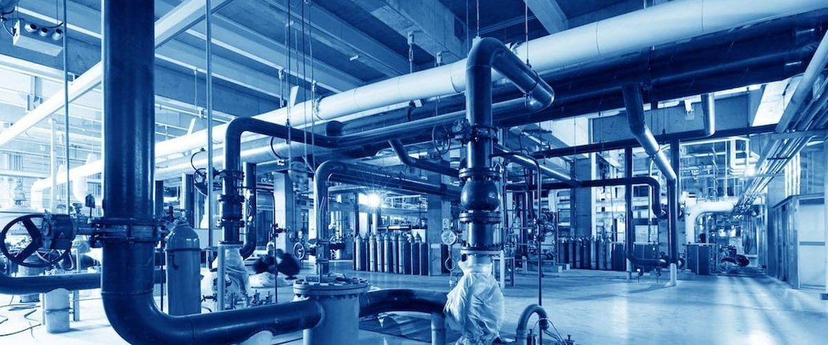 A Factory Filled With Lots of Pipes and Valves — All Plumb & Gas in North Boambee Valley, NSW