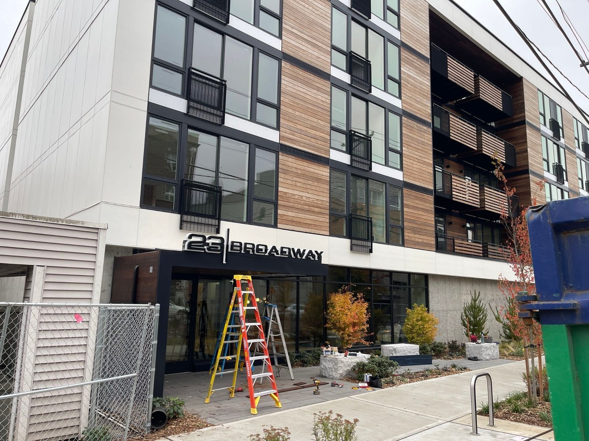 Finished Thermory wood siding and aluminum panels at 23 Broadway in T